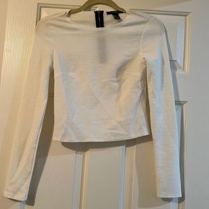 Forever 21 white shirt with a zipper on the back.